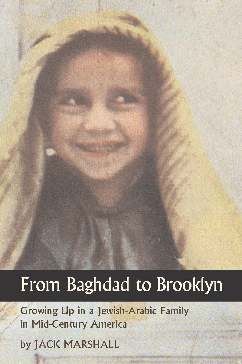 Cover of "From Baghdad to Brooklyn," by Jack Marshall, which shows a grainy photo of a small child smiling while wearing a yellow blanket on their head. 