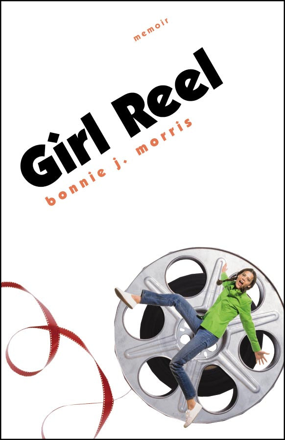 Cover of "Girl Reel," by Bonnie J Morris, which features an open reel with tape swirling out of it, and a young girl wearing a green blouse and jeans positioned in front of the reel. 