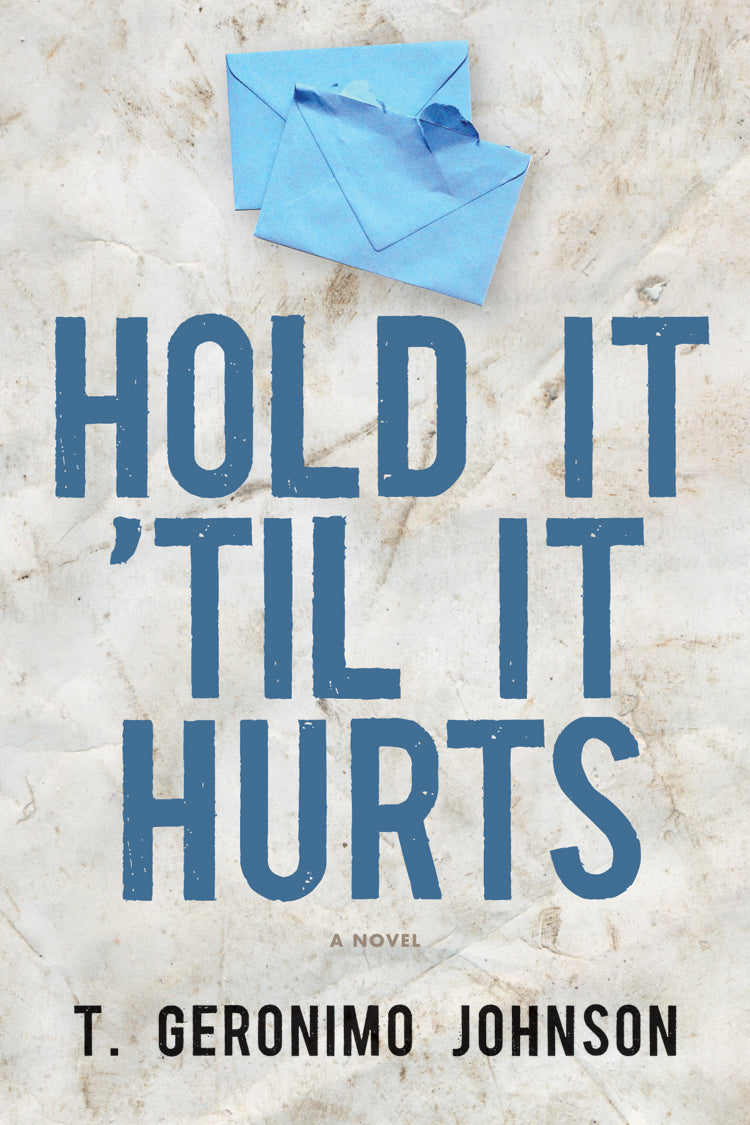 Cover of "Hold It 'Til It Hurts," by T. Geronimo Johnson, which features two blue envelopes sitting on a white marble surface. 