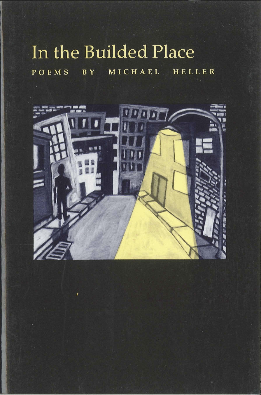 Cover of "In the Builded Place," by Michael Heller, which shows a black and white sketch of a city at night, with the only color coming from the yellow street lamp. There is also the figure of a person standing on the sidewalk across from said street lamp. 