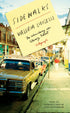 Cover of "Sidewalks," by Valeria Luiselli, which shows an image of a street lined with cars, houses, and a sidewalk with a pedestrian. The title is written on a sticky note that is posted above this image. 